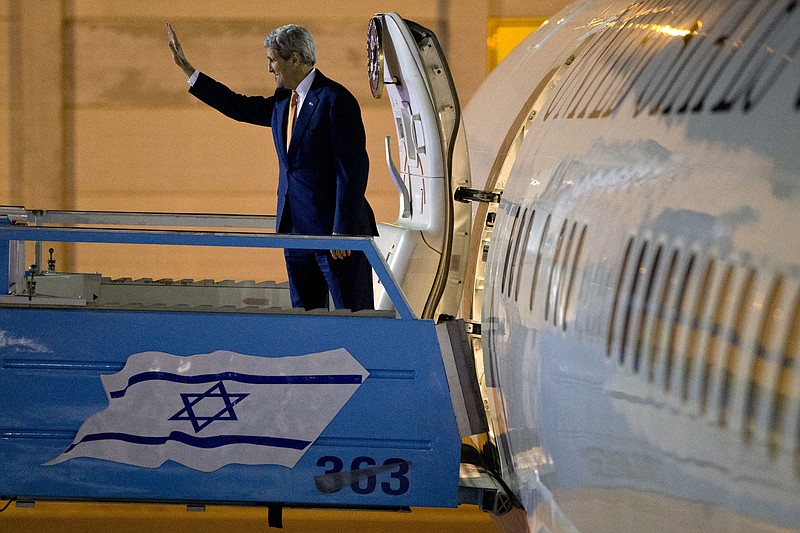 
              FILE -- In this Nov. 24, 2015 file photo, U.S. Secretary of State John Kerry waves as he boards the plane on departure from Israel after meetings in Jerusalem and the West Bank city of Ramallah. A senior leader of a Jewish settlement council is calling U.S. Secretary of State John Kerry "a stain on American foreign policy" and "ignorant of the issues." Oded Revivi, chief foreign envoy of the Yesha Council, made the remarks ahead of Kerry's final policy speech on Mideast peace Wednesday.
 (AP Photo/Jacquelyn Martin, Pool, File)
            