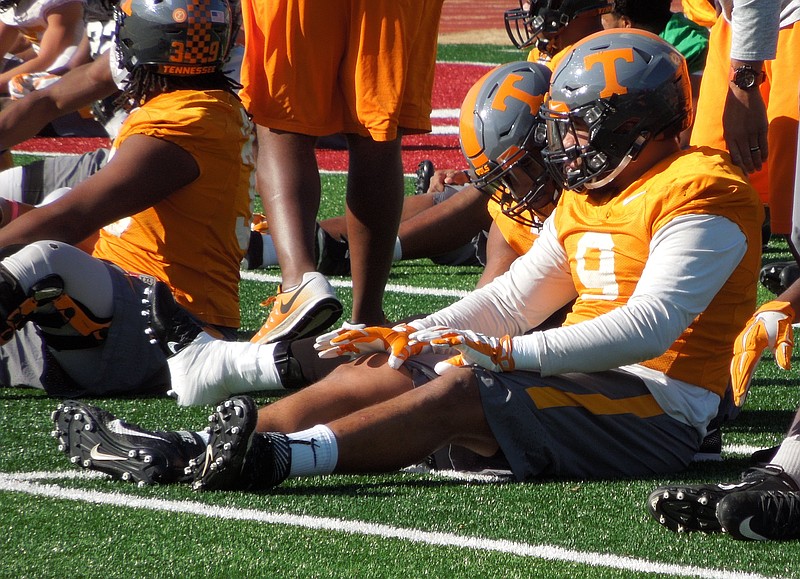 All-American defensive end Derek Barnett stretches as Tennessee opens practice at Montgomery Bell Academy in Nashville on Dec. 27. The Vols face Nebraska in the Music City Bowl.