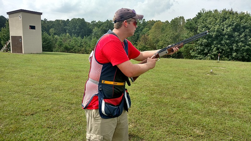 Eli Christman, a member of the Soddy Daisy Scholastic Clays, gets in position to shoot.