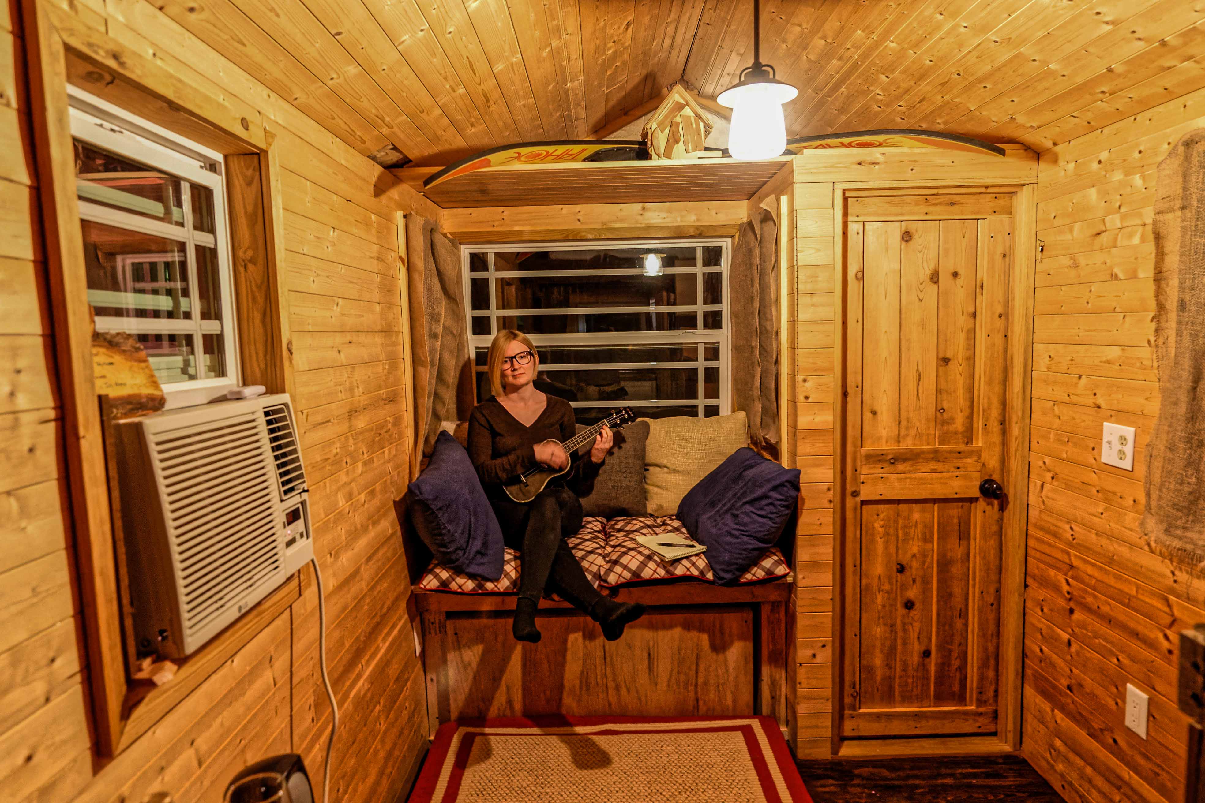One must get creative when entertaining oneself inside a tiny home. Tiny instruments help. (Photo by Jennifer Woods)