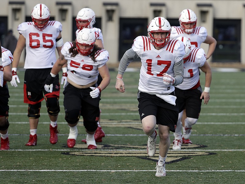 Nebraska quarterback Ryker Fyfe (17) warms up during practice, Monday, Dec. 26, 2016, in Nashville, Tenn. Nebraska is scheduled to play Tennessee in the NCAA college football Music City Bowl Friday. (AP Photo/Mark Humphrey)