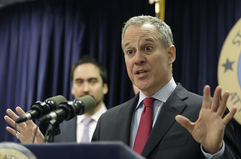 
              FILE- In this March 21, 2016 file photo, New York Attorney General Eric Schneiderman. Two weeks after officials in two dozen states asked Donald Trump to kill one of President Barack Obama's plans to curb global warming, Schneiderman was lead author on a rebuttal letter signed by Democratic attorneys general in 15 states, plus four cities and counties, asking the president-elect to save it. (AP Photo/Seth Wenig, File)
            