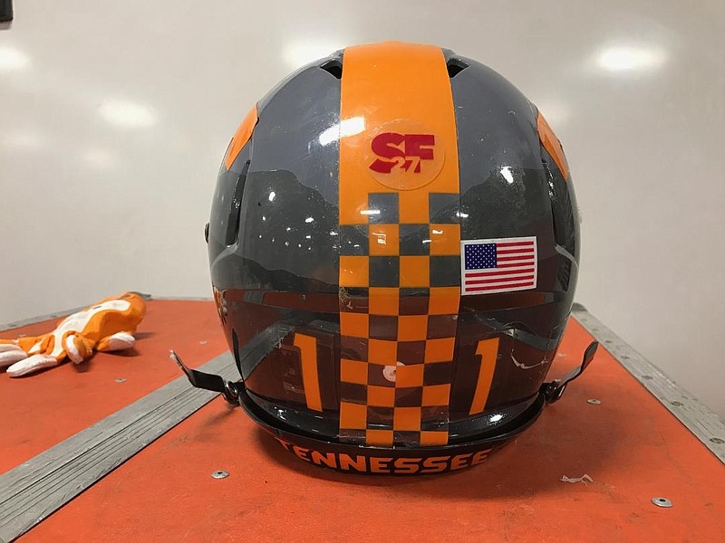 Tennessee will wear an "SF27" sticker on its helmets in the Music City Bowl to memorialize late Nebraska punter Sam Foltz, who was killed in a car accident last summer. (Photo courtesy of Ryan Robinson/Tennessee Athletics).