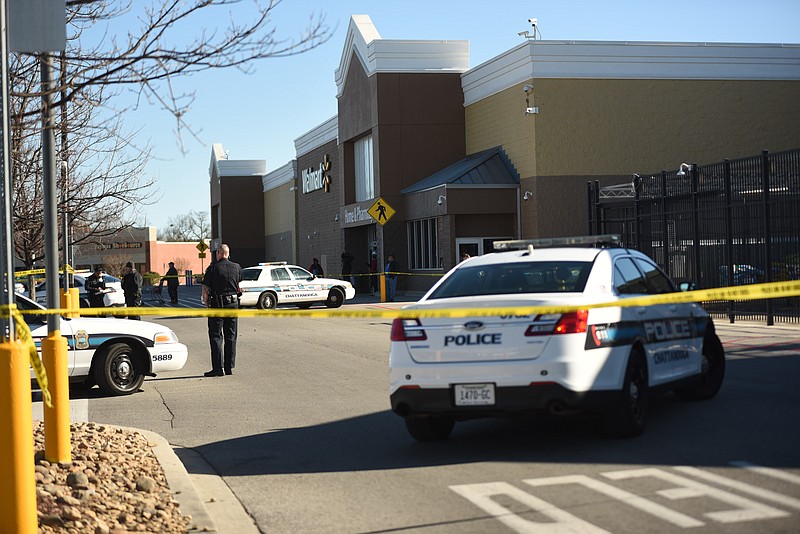 Chattanooga police investigate a shooting Friday morning in the front parking lot of the Walmart store near Eastgate.