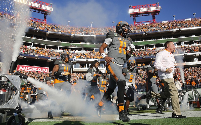 Tennessee takes the field for the Vols' Music City Bowl game against the Nebraska Cornhuskers at Nissan Stadium on Friday, Dec. 30, 2016, in Nashville, Tenn. Tennessee won 38-24.