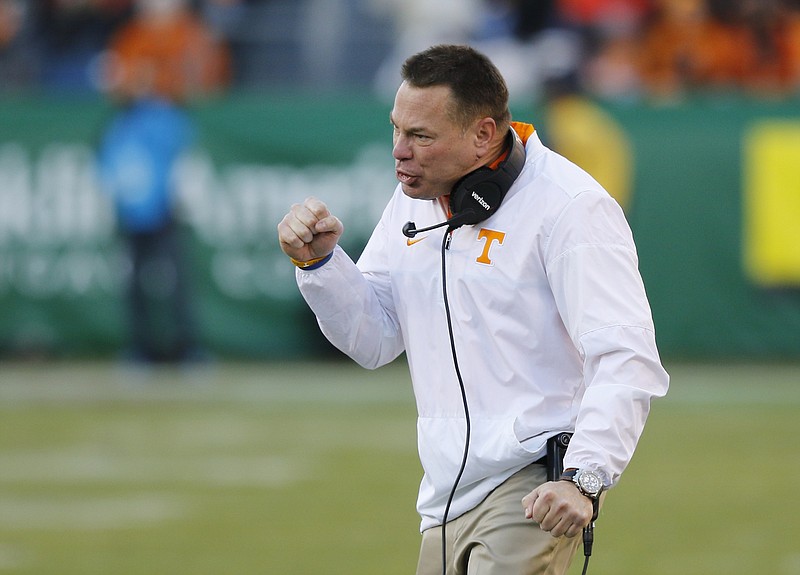 Tennessee coach Butch Jones pumps his fist after a touchdown in the first half of the Vols' Music City Bowl game against the Nebraska Cornhuskers at Nissan Stadium on Friday, Dec. 30, 2016, in Nashville, Tenn. Tennessee won 38-24.