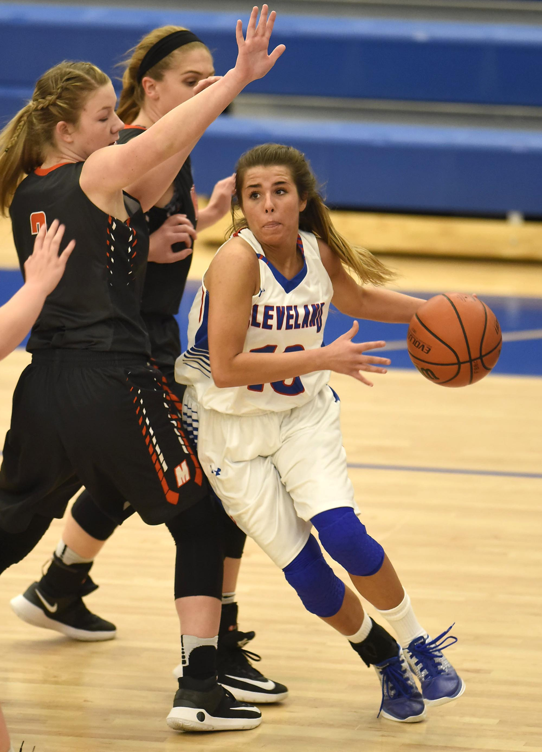 Cleveland's Sofia Stomatiadis (13) drives past two Meigs County defenders. The Meigs County Lady Tigers visited the Cleveland Lady Raiders in TSSAA girls basketball action during the Cleveland Holiday Tournament held on Friday December 30, 2016.