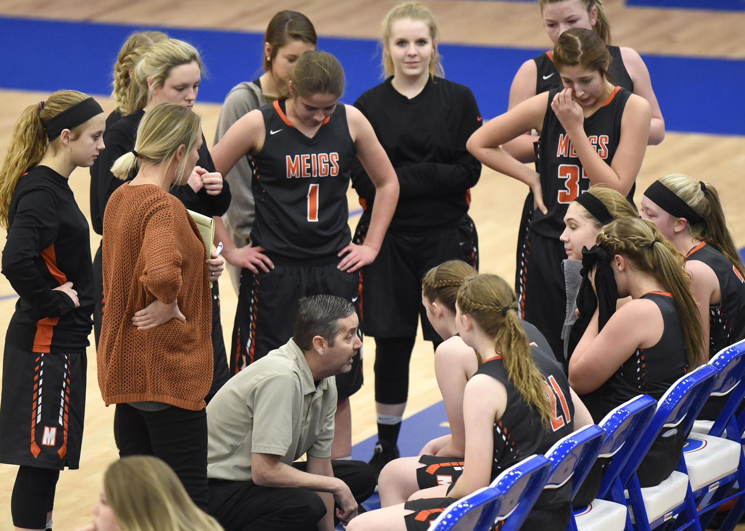 Meigs County coach Jason Powell instructs his team during a timeout. The Meigs County Lady Tigers visited the Cleveland Lady Raiders in TSSAA girls basketball action during the Cleveland Holiday Tournament held on Friday December 30, 2016.