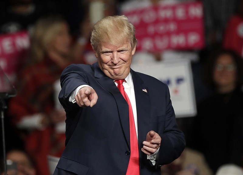 
              FILE- In this Oct. 31, 2016 file photo, then Republican presidential candidate Donald Trump acknowledges the crowd before speaking at Macomb Community College in Warren, Mich. Northern Michigan's Lake Superior State University on Saturday, Dec. 31, 2016, released its 42nd annual List of Words Banished from the Queen's English for Misuse, Overuse and General Uselessness. "Bigly" made Merriam-Webster's Top 10 for 2016. Trump was fond this year of saying "big league" but making it sound like "bigly," an archaic adverb or adjective dating to around 1400. (AP Photo/Carlos Osorio, File)
            