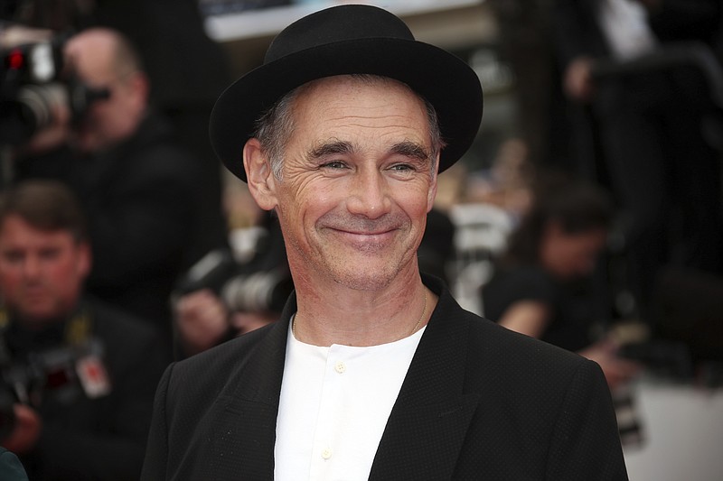 
              FILE - In this file photo dated  Saturday, May 14, 2016, actor Mark Rylance poses for photographers at the screening of the film The BFG, at the 69th international film festival, Cannes, southern France. During the Queen's 2017 New Year Honors list Rylance, 56, receives a knighthood, recognised for his services to theatre. (AP Photo/Joel Ryan, FILE)
            