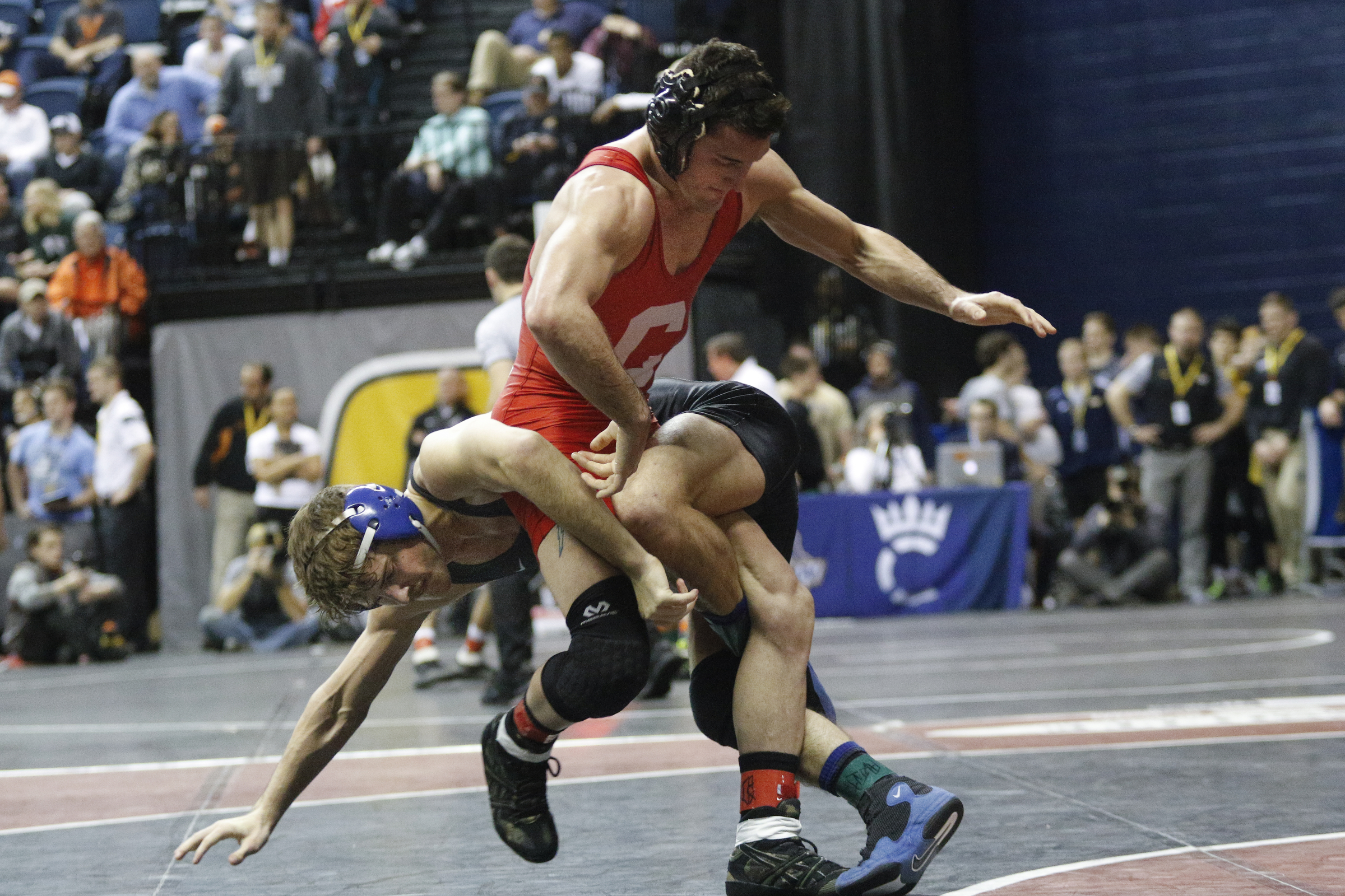Cornell wrestler Mark Grey, top, slips through Duke wrestler Cole Baumgartner in their round of 16 bout of the Southern Scuffle wrestling tournament at McKenzie Arena on Sunday, Jan. 1, 2016, in Chattanooga, Tenn.
