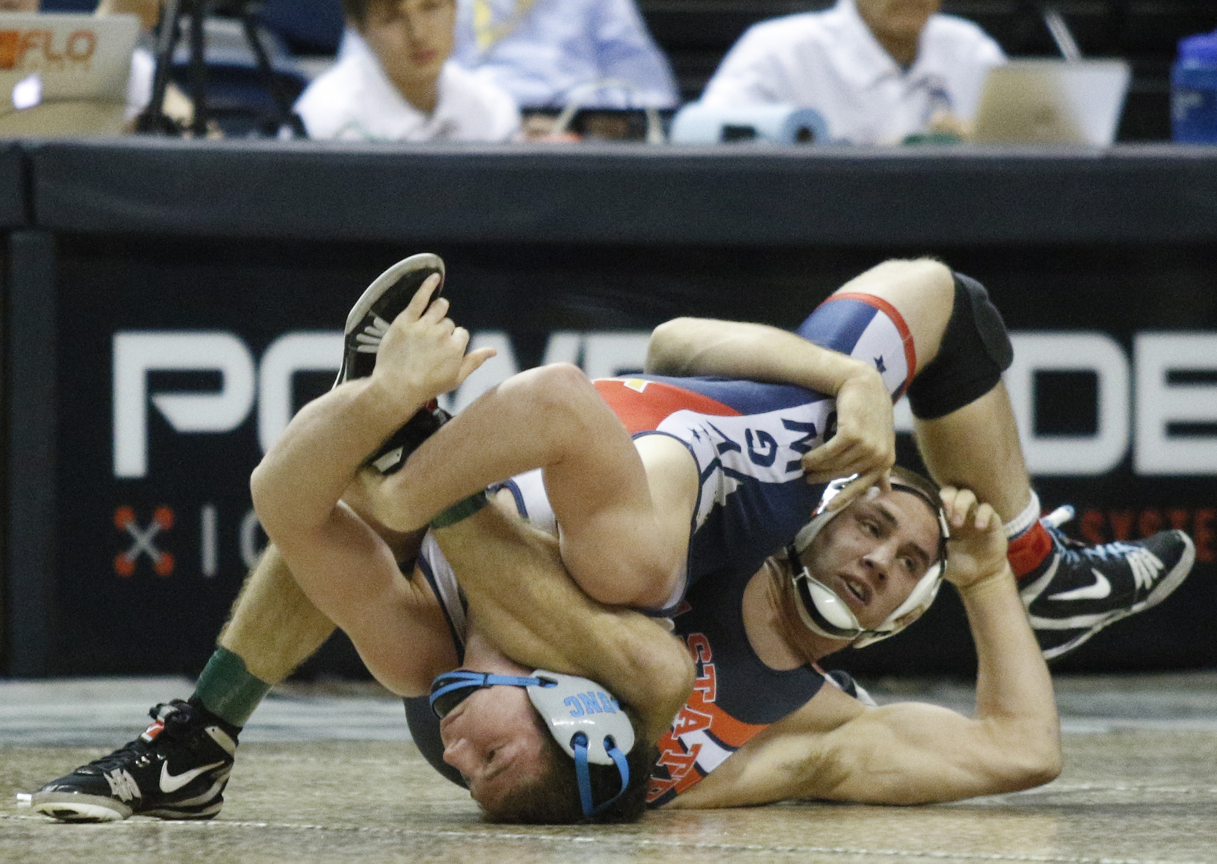 Oklahoma State's Dean Heil, right, wrestles North Carolina's A.C. Headlee during the first day of UTC's Southern Scuffle tournament Sunday at McKenzie Arena.