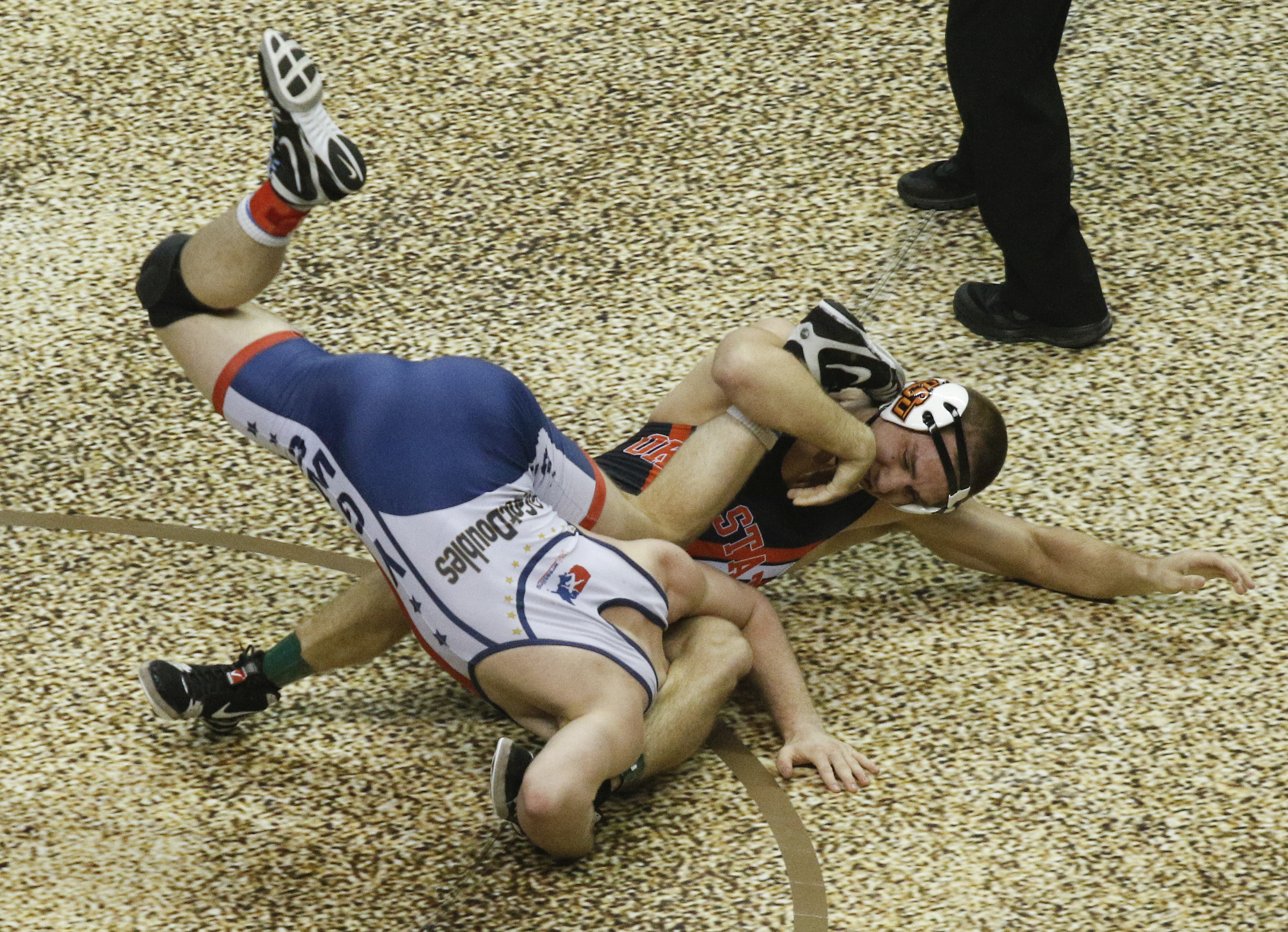 Oklahoma State wrestler Dean Heil, right, wrestles North Carolina wrestler A.C. Headlee in their round of 16 bout of the Southern Scuffle wrestling tournament at McKenzie Arena on Sunday, Jan. 1, 2016, in Chattanooga, Tenn.