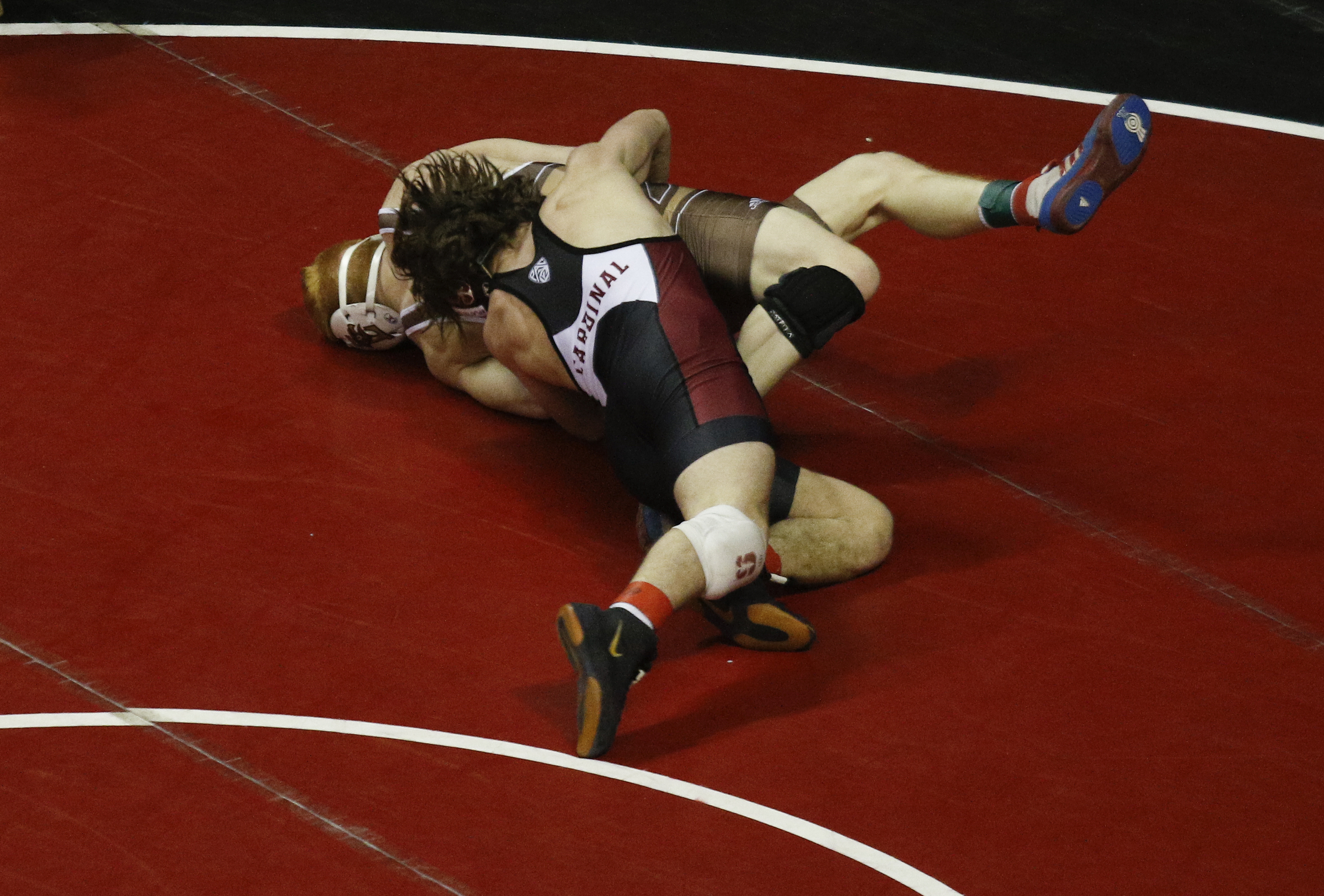 Stanford wrestler Joey McKenna, bottom, wrestles Lehigh wrestler Ryan Pomrinca in their round of 16 bout of the Southern Scuffle wrestling tournament at McKenzie Arena on Sunday, Jan. 1, 2016, in Chattanooga, Tenn.