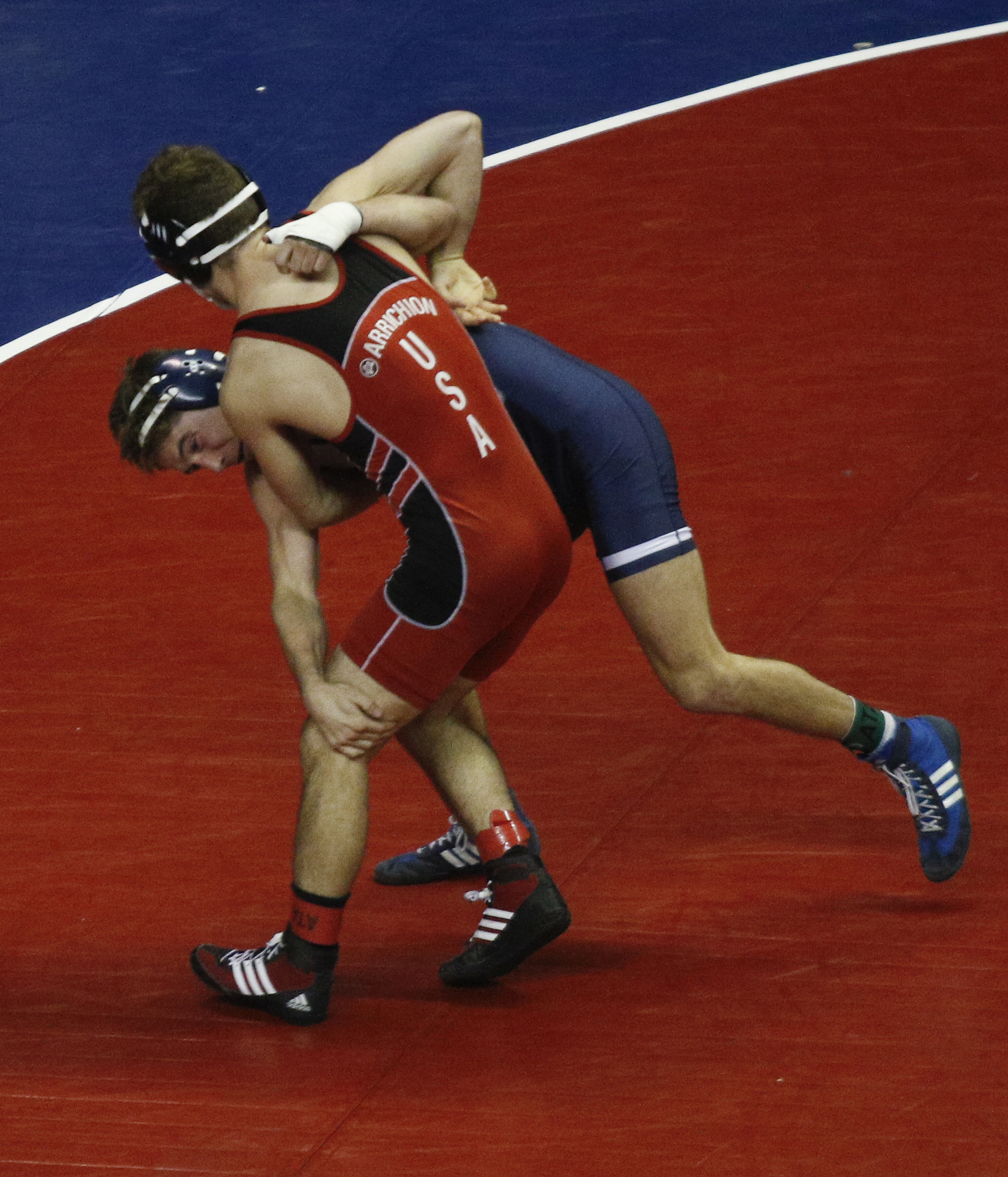 Chattanooga wrestler Roman Boylen, behind, wrestles NCSU wrestler Will Clark in their round of 16 bout of the Southern Scuffle wrestling tournament at McKenzie Arena on Sunday, Jan. 1, 2016, in Chattanooga, Tenn.