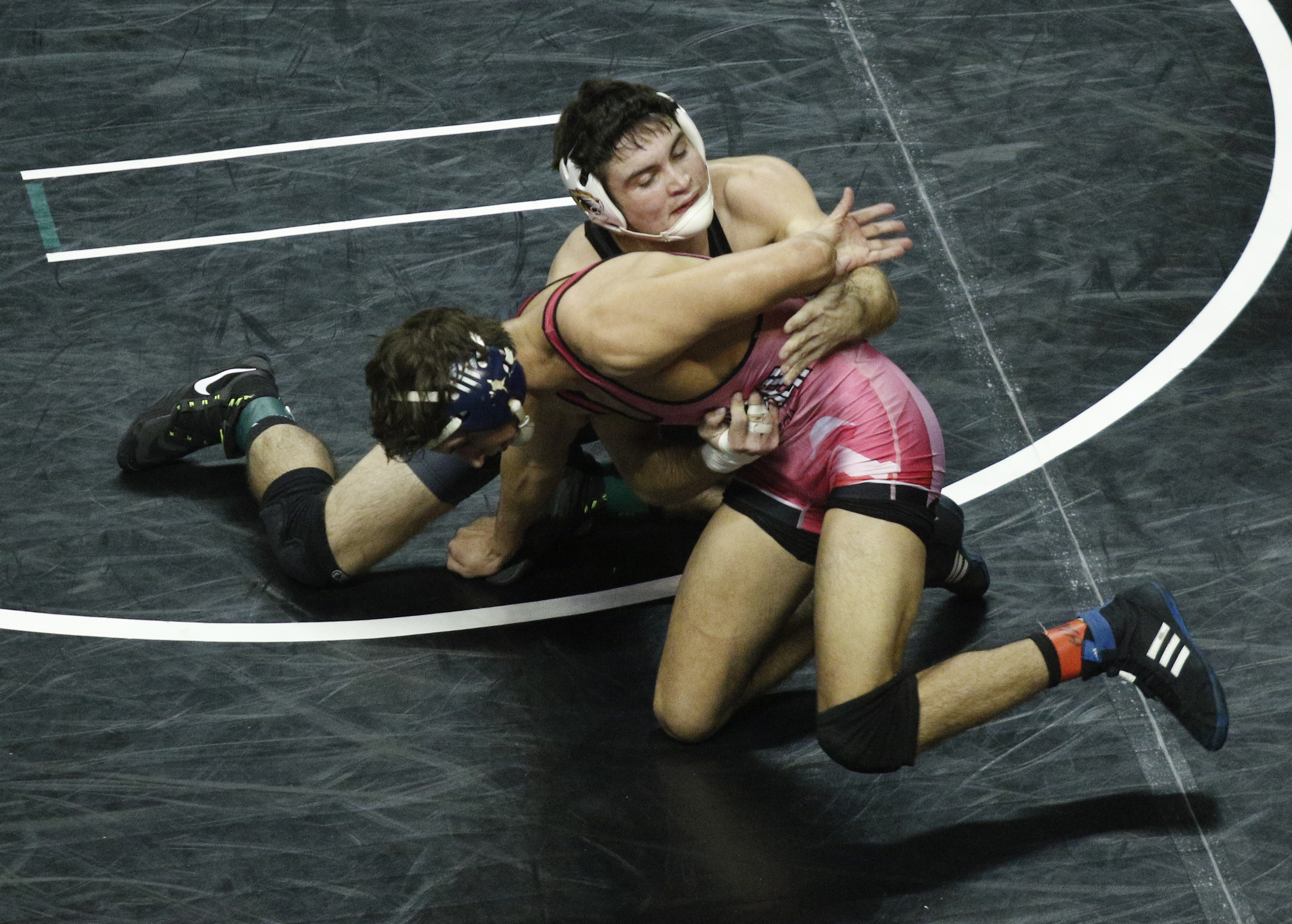 Chattanooga wrestler Michael Pongracz, bottom, wrestles Missouri wrestler Matt Manley in their round of 16 bout of the Southern Scuffle wrestling tournament at McKenzie Arena on Sunday, Jan. 1, 2016, in Chattanooga, Tenn.