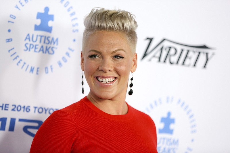 
              FILE - In this Oct. 8, 2015, file photo, Pink arrives at the Autism Speaks to LA Celebrity Chef Gala in Santa Monica, Calif. Pink kicked off the new year by sharing the first photo of her new baby with his big sister. . The 37-year-old singer, whose real name is Alecia Moore, posted a picture of her daughter Willow holding baby Jameson on Instagram Sunday, Jan. 1, 2017. The 5-year-old looks thrilled and has a big smile on her face. She’s also showing off some pink highlights in her hair. Jameson Moon Hart was born on Dec. 26, 2016. (Photo by Rich Fury/Invision/AP, File)
            