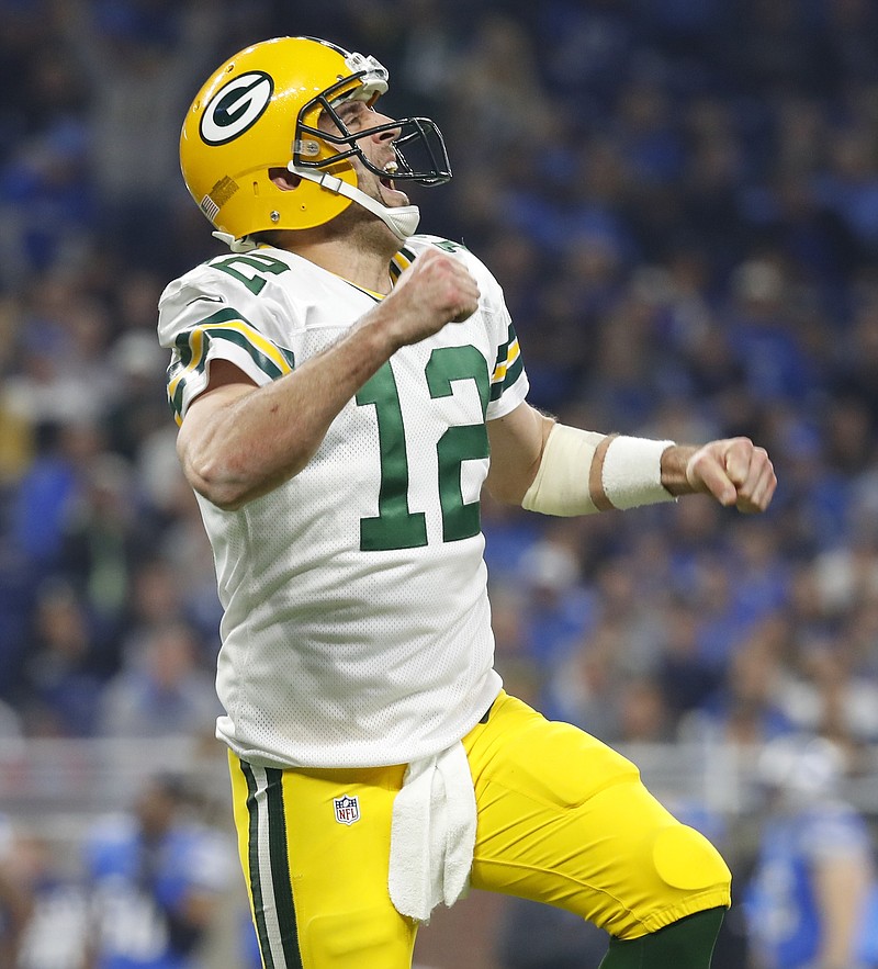 
              Green Bay Packers quarterback Aaron Rodgers reacts after a 9-yard pass to wide receiver Davante Adams for a touchdown during the second half of an NFL football game against the Detroit Lions, Sunday, Jan. 1, 2017, in Detroit. (AP Photo/Paul Sancya)
            