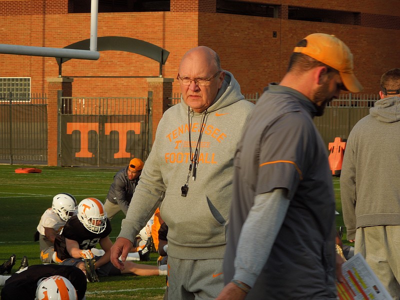 Tennessee offensive coordinator Mike DeBord looks on during a Vols' practice at Haslam Field in November 2016.