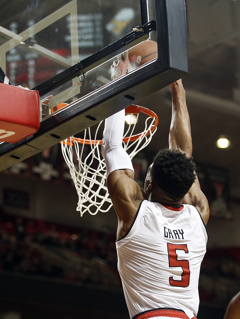 
              Texas Tech's Justin Gray (5) dunks the ball during an NCAA college basketball game against West Virginia, Tuesday, Jan. 3, 2017, in Lubbock, Texas. (Brad Tollefson/Lubbock Avalanche-Journal via AP)
            