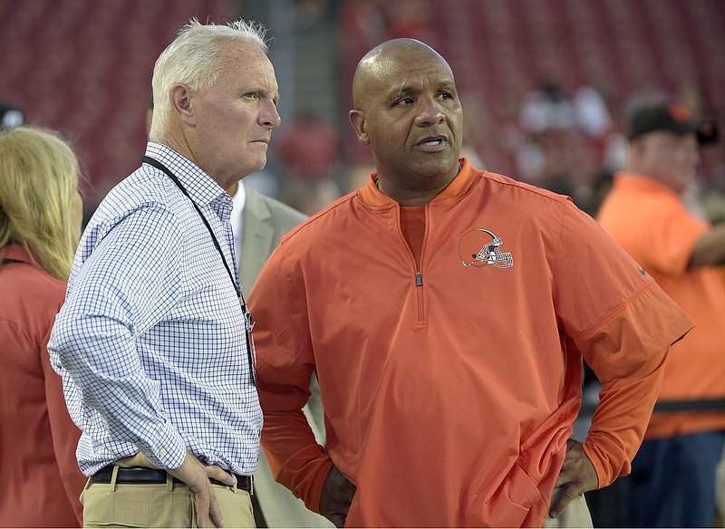 
              FILE - In this Aug. 26, 2016, file photo, Cleveland Browns owner Jimmy Haslam, left, and head coach Hue Jackson watch warm-ups before an NFL preseason football game against the Tampa Bay Buccaneers in Tampa, Fla. The Browns finished the season 1-15. (AP Photo/Phelan M. Ebenhack, File)
            