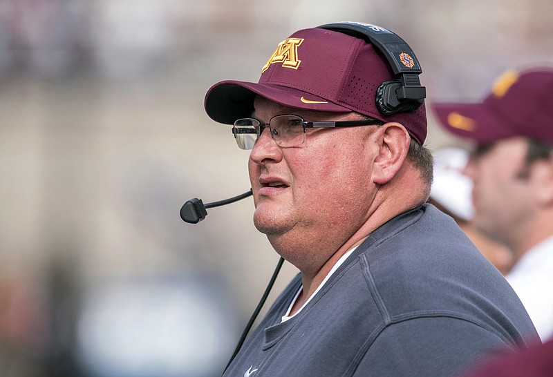 
              FILE - In this Oct. 29, 2016, file photo, Minnesota coach Tracy Claeys watches from the sideline during the second quarter of an NCAA college football game against Illinois at Memorial Stadium in Champaign, Ill. Two people with knowledge of the decision tell The Associated Press on Tuesday, Jan. 3, 2017,  that Minnesota has fired coach Tracy Claeys. The move comes two weeks after the football program became embroiled in a standoff with the administration over the suspension of 10 players in connection with allegations of sexual assault. The people spoke to the AP on condition of anonymity because the school has not announced the move. (AP Photo/Bradley Leeb, File)
            