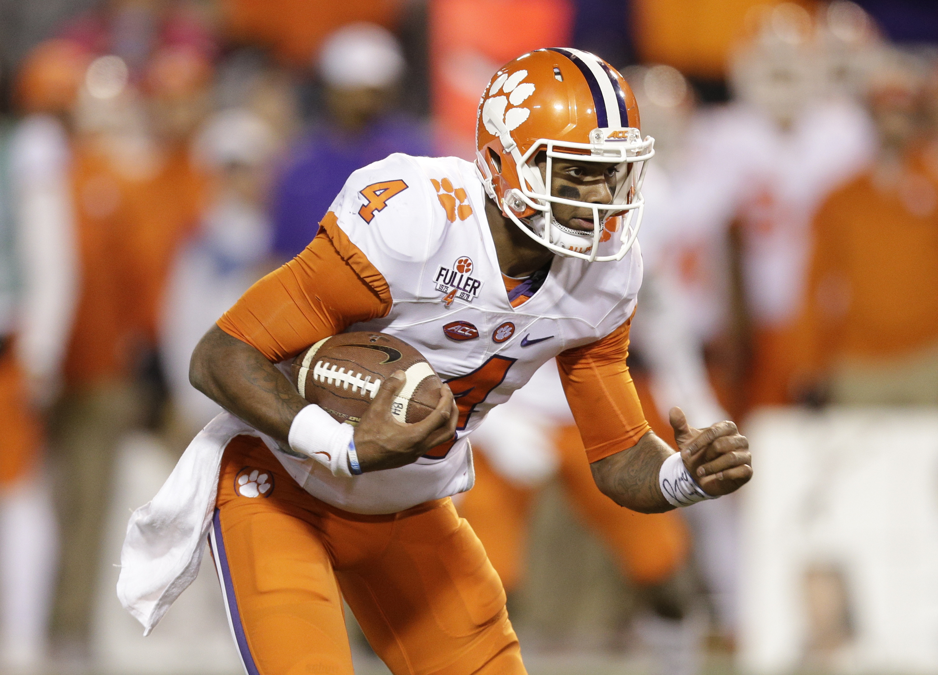 Clemson's Deshaun Watson (4) runs against Wake Forest in the second half of an NCAA college football game in Winston-Salem, N.C., Saturday, Nov. 19, 2016. (AP Photo/Chuck Burton)