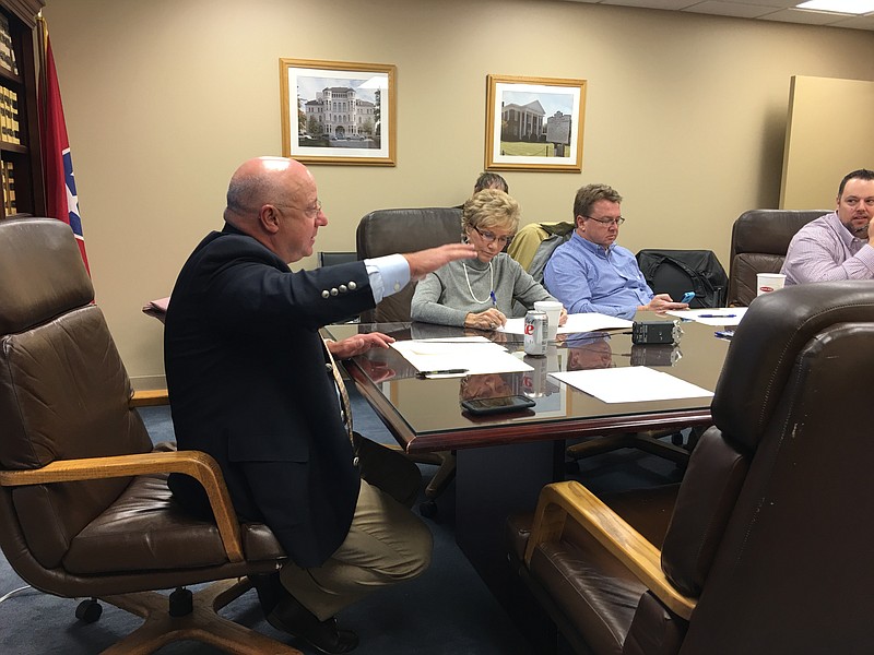 Hamilton County Election Commission Chairman Michael Walden, left, tells his colleagues he does not want to add more early voting sites based on hunches or requests from politicians.
