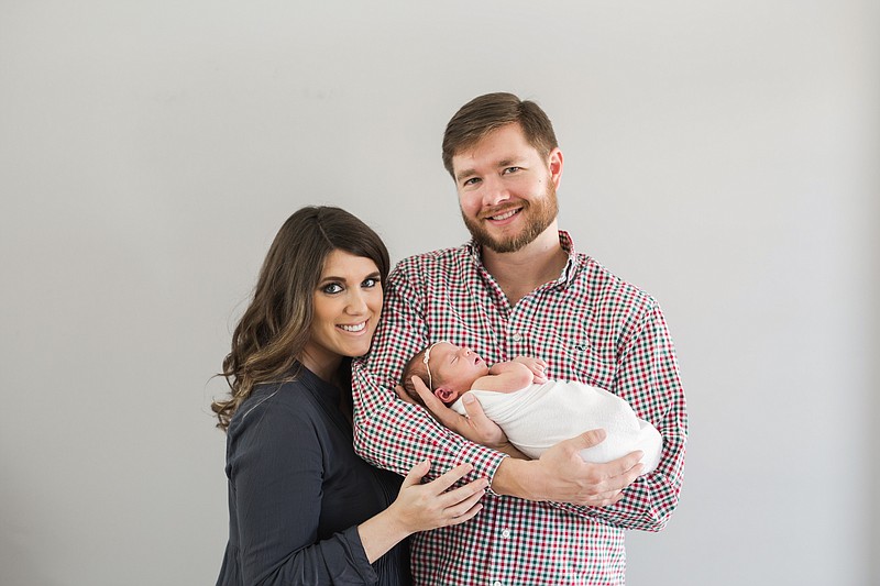 When Holley and Spencer Rudolph chose a home birth, they had no idea he would deliver daughter Ramsey while being talked through the delivery over the phone by paramedics.