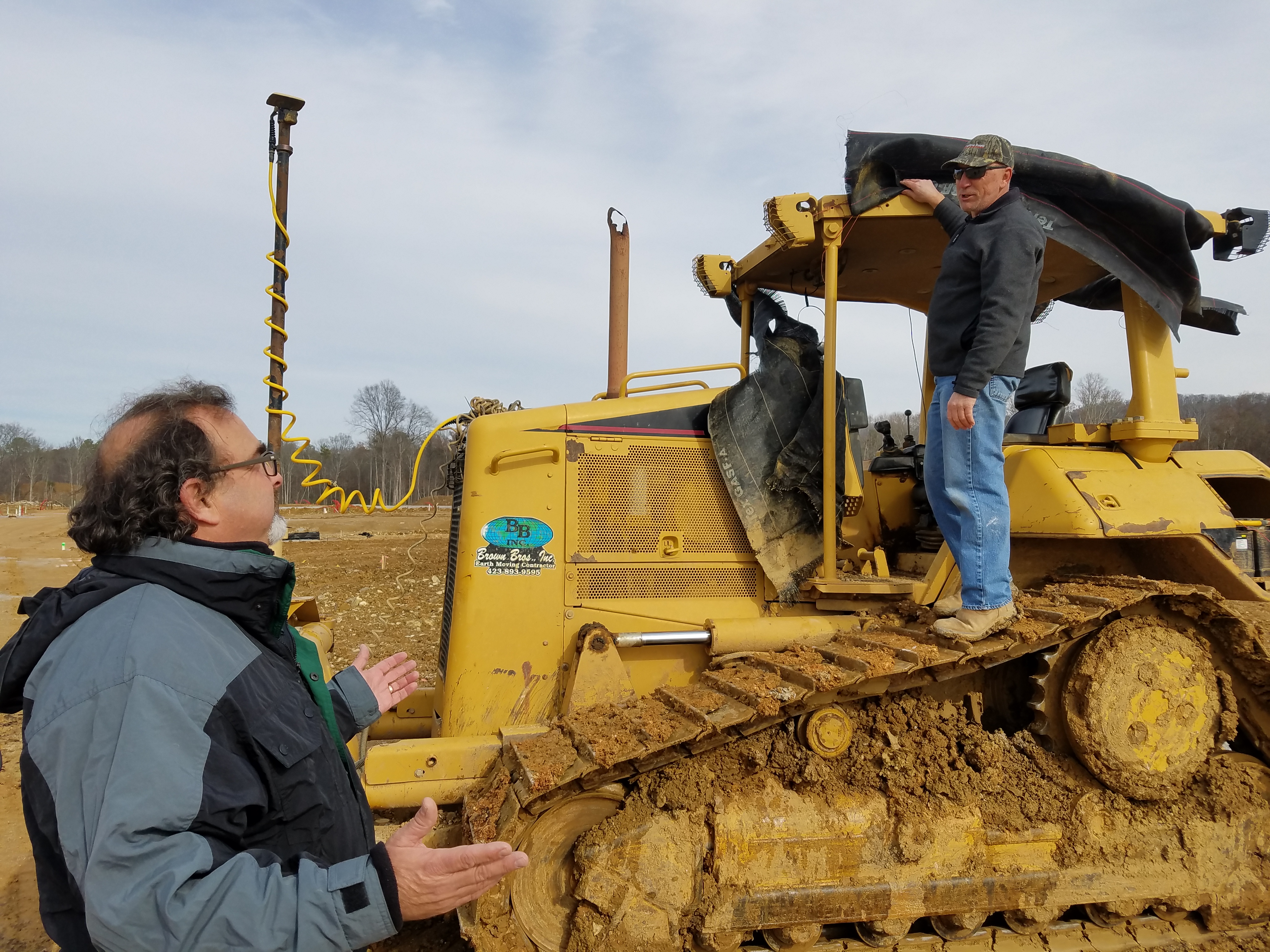 Earth-moving work at Cambridge Square by Kevin Sandidge, who drives the bulldozer, and Barry Payne. Both work for Barry Payne Development, which will build homes at the Ooltewah housing and commercial development.
