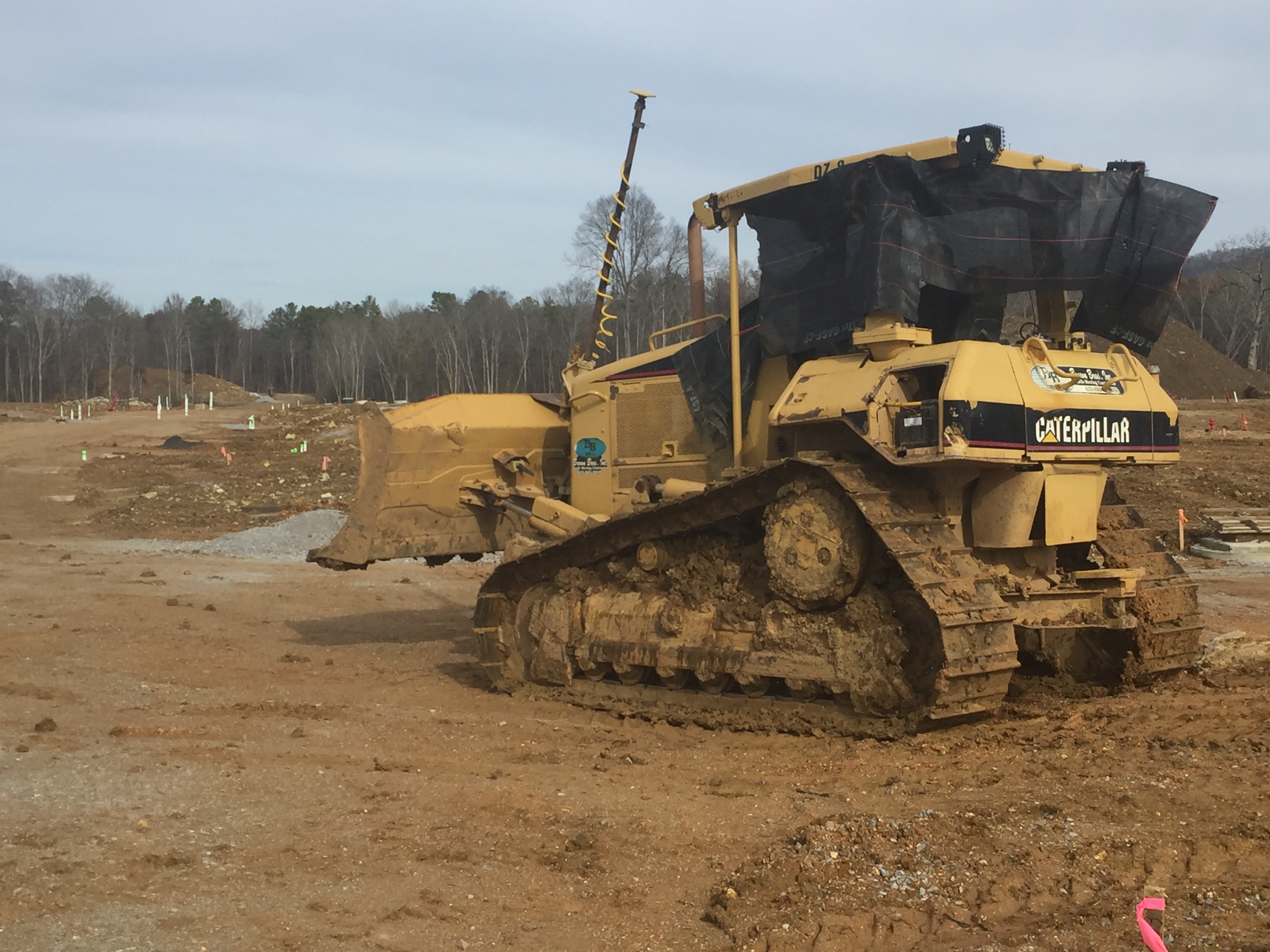 Earth-moving work underway at Cambridge Square in Ooltewah, where some 300 suburban homes are slated to be built near a 'town square' that recruited restaurants and other businesses popular with professionals who work downtown.