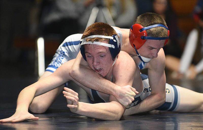 Soddy-Daisy's Jacob Kilgore and Cleveland's Colton Landers wrestle Thursday, January 5, 2017 in the Soddy-Daisy wrestling arena.