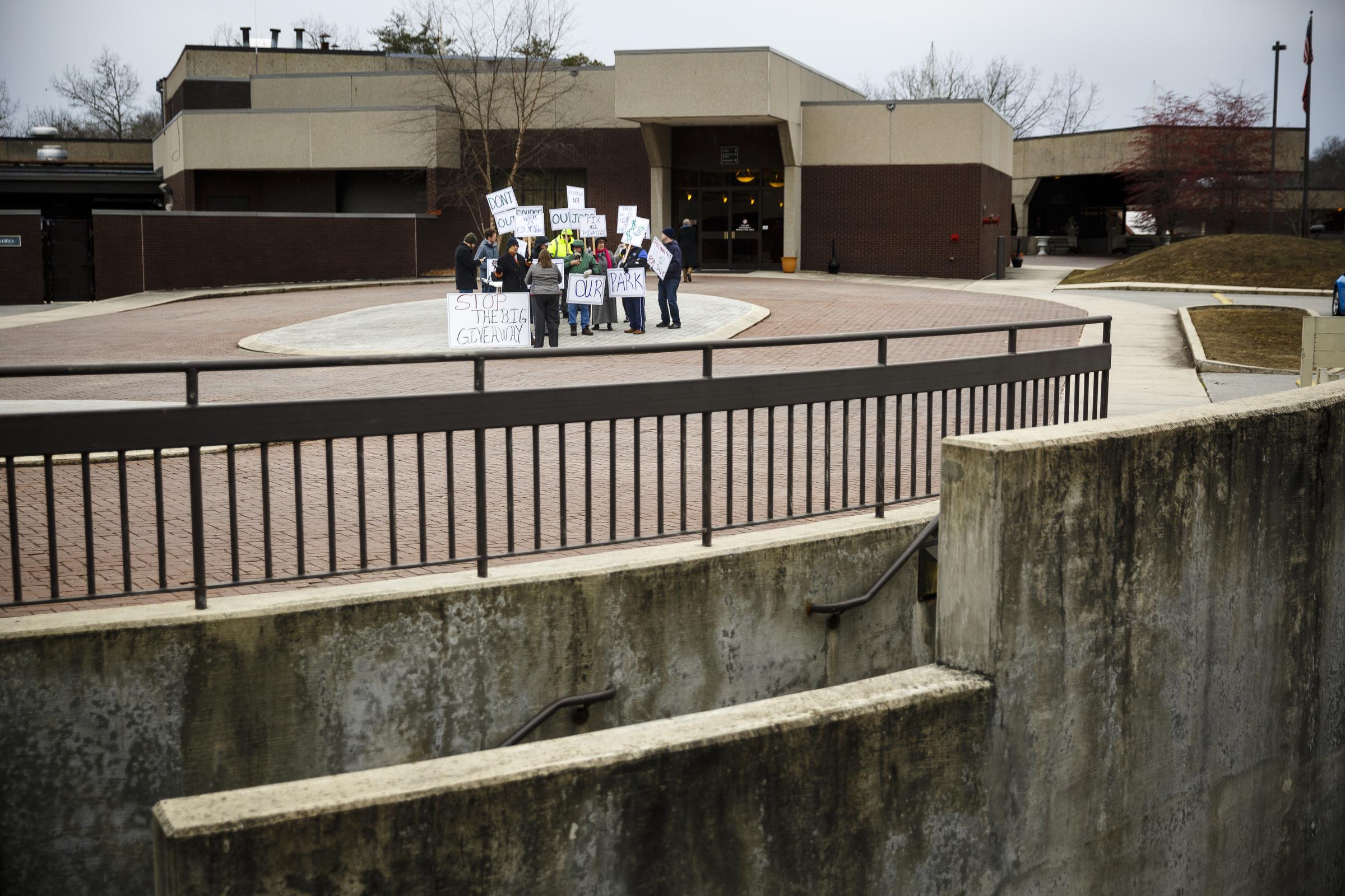 Demonstrators protest the privatization of the Fall Creek Falls State Park's hospitality services outside of the park's inn on Thursday, Jan. 5, 2017, near Spencer, Tenn. The Tennessee State Employees Association organized the protest, which coincided with a meeting by state officials and potential bidders at the park's inn.