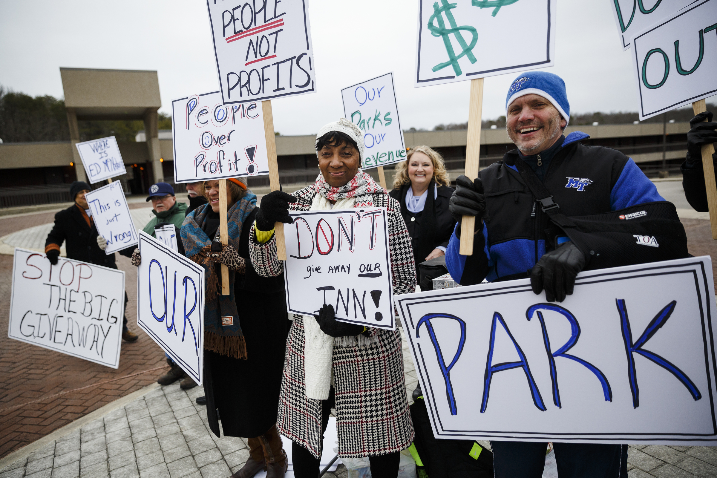 Terry Carroll, right, Latanya McAdoo, center, and other demonstrators protest the privatization of the Fall Creek Falls State Park's hospitality services outside of the park's inn on Thursday, Jan. 5, 2017, near Spencer, Tenn. The Tennessee State Employees Association organized the protest, which coincided with a meeting by state officials and potential bidders at the park's inn.