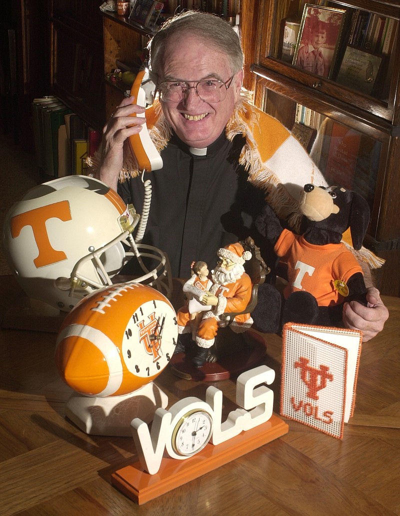 Monsignor George Edward Schmidt Jr. was a priest at Saints Peter and Paul Catholic Church and a longtime University of Tennessee fan.