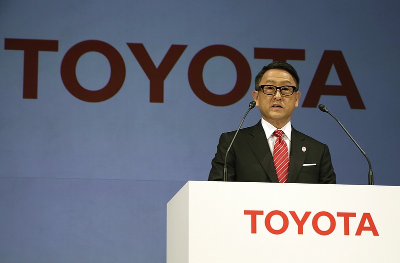 
              FILE- In this March 13, 2015, file photo, Toyota President and CEO Akio Toyoda speaks during a press conference in Tokyo. Toyota Motor Corp. stock is skidding in Tokyo trading after U.S. President-elect Donald Trump said Thursday, Jan. 5, 2017 on Twitter that the Japanese automaker faces a "big border tax" if it goes ahead with plans on a new Mexico plant. (AP Photo/Eugene Hoshiko, File)
            