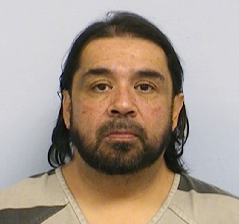 
              This booking photo provided by the Austin Police Department shows Florentino Herrera who is being held in Travis County Jail in Austin on charges of evidence tampering and driving while intoxicated. Authorities say Herrera tried to destroy cocaine hidden under his belly fat while being taken to jail after failing a field sobriety test early on New Year's Eve. (Austin Police Department via AP)
            