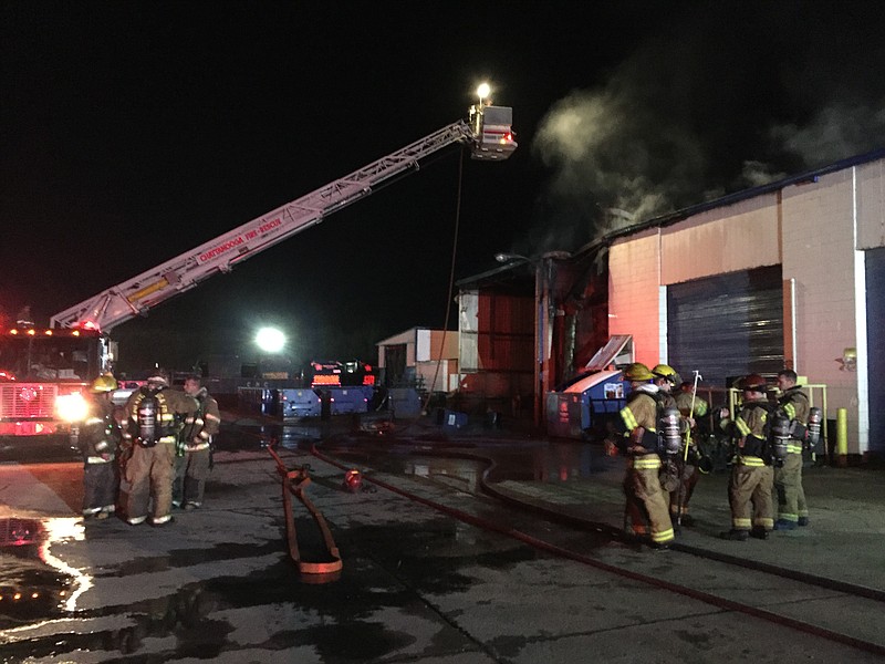 Firefighters work to put out a fire early Thursday morning at Republic Services at 1000 E. 38th St. in Chattanooga.