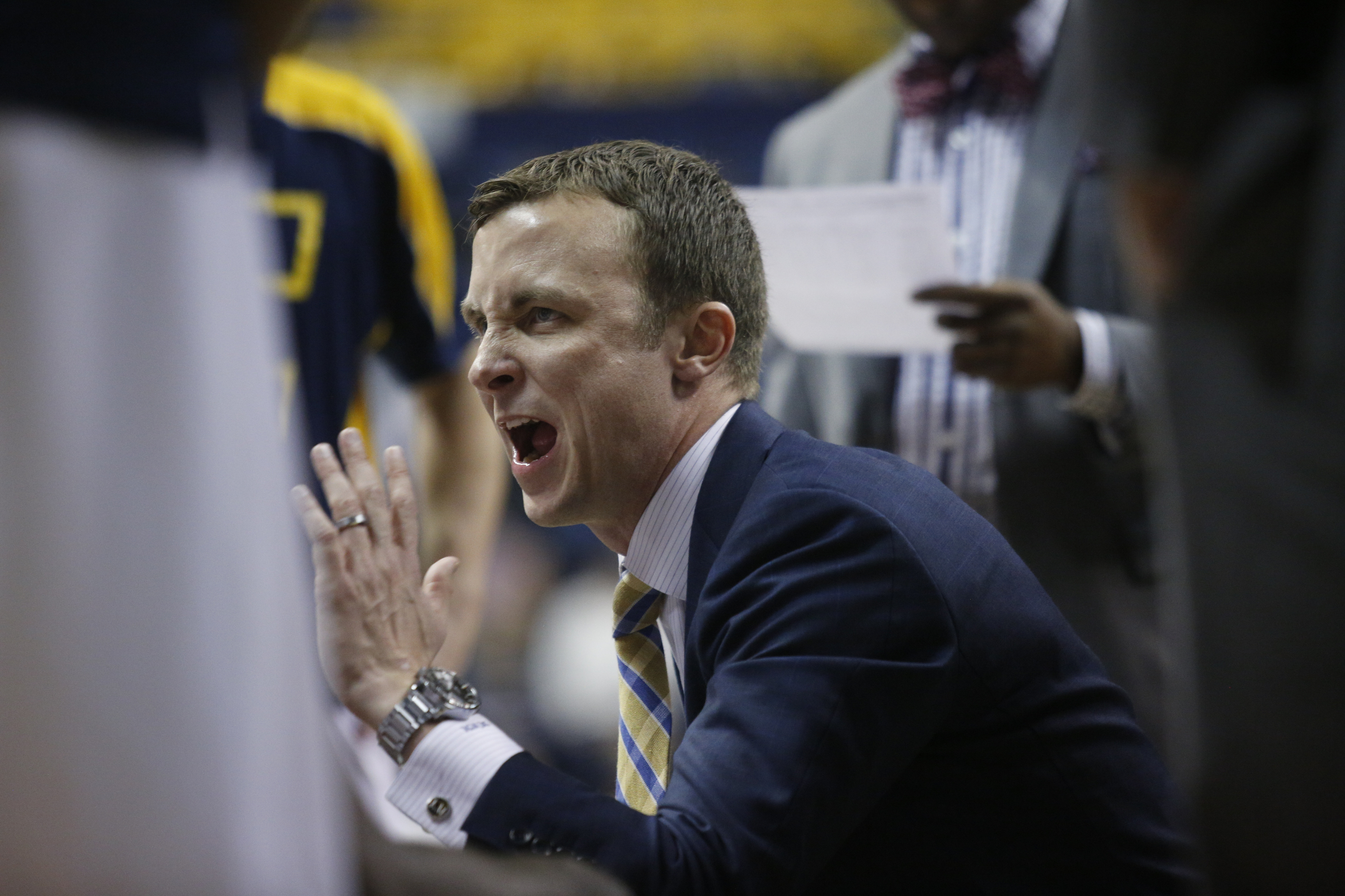 UTC men's basketball coach Matt McCall shouts to players during a timeout in the Mocs' home basketball game against Furman at McKenzie Arena on Saturday, Jan. 7, 2017, in Chattanooga, Tenn.