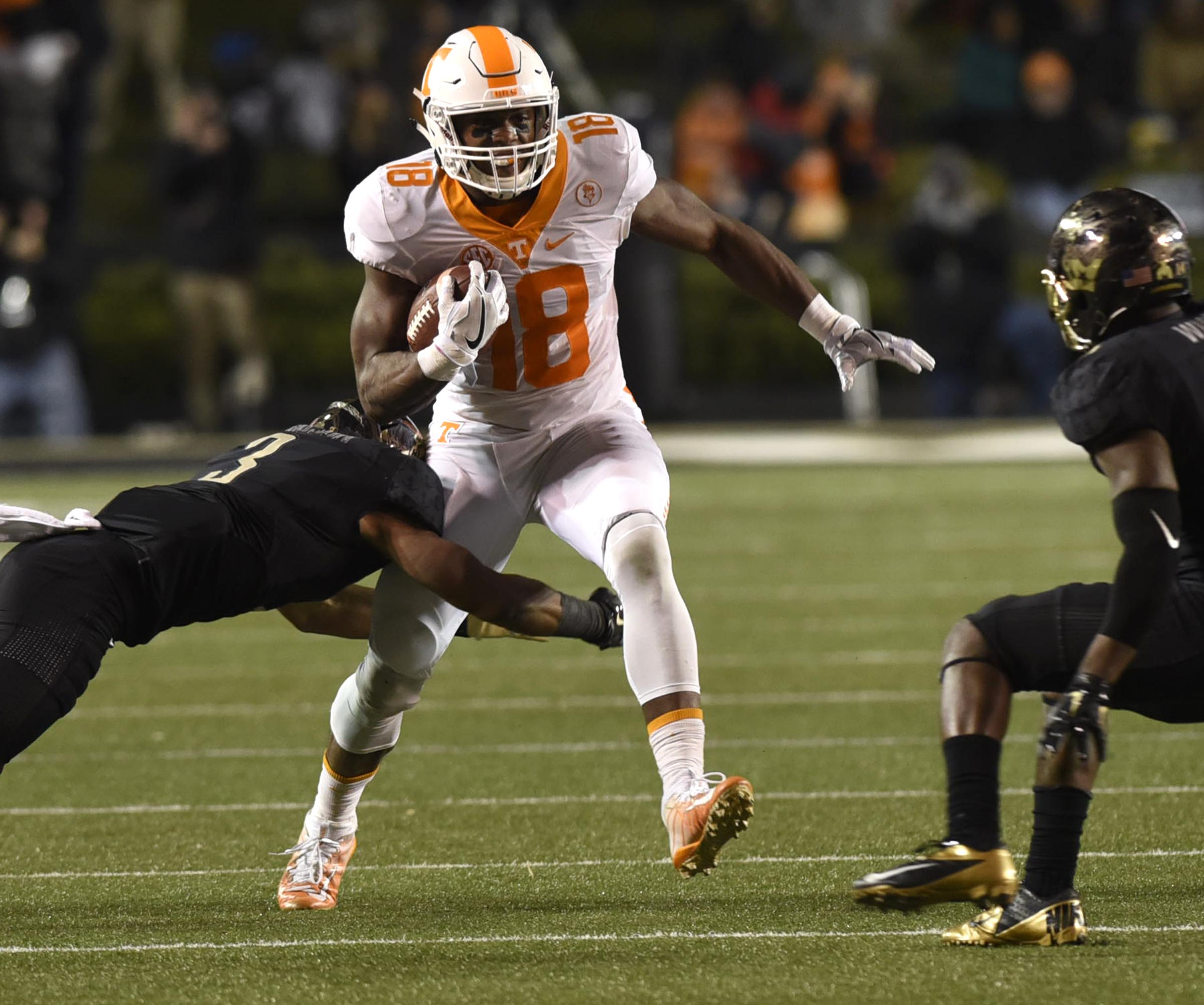 Tennessee's Jason Croom (18) picks up yards after a pass reception. The Tennessee Volunteers visited the Vanderbilt Commodores in a cross-state rivalry at Dudley Stadium on November 26, 2016.