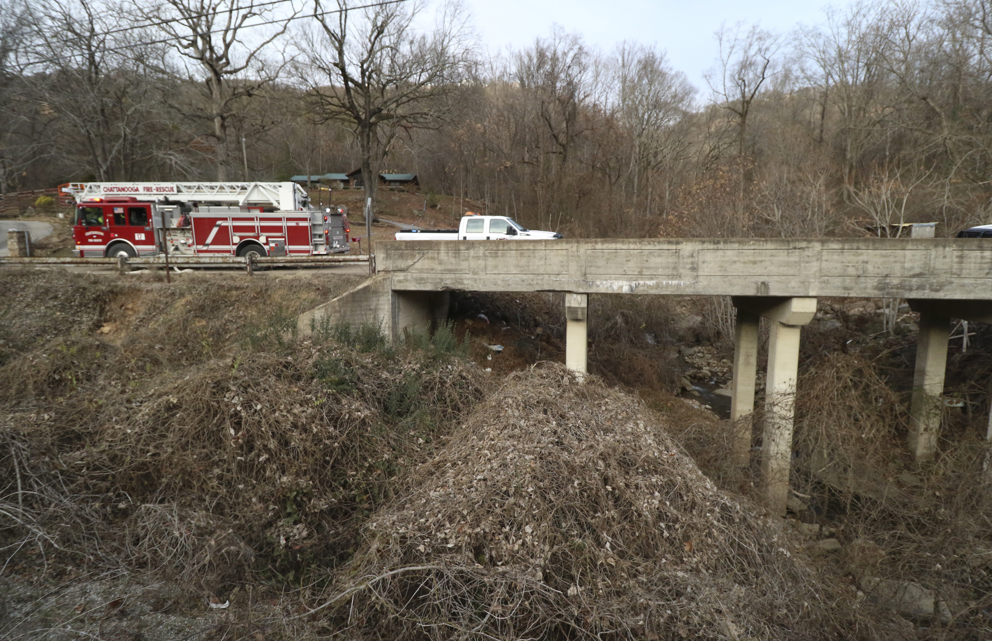 Staff Photo by Dan Henry / The Chattanooga Times Free Press- 1/8/17. Colonial pipeline group personnel and emergency workers search for a liquid gas leak along Shoal Creek near the suck Creek boat ramp on Sunday, January 8, 2017.