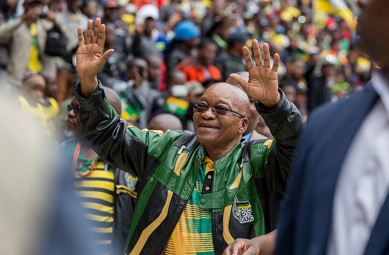 
              South African president Jacob Zuma attends the ruling African National Congress (ANC) 105th anniversary celebrations in Soweto, Johannesburg, South Africa, Sunday Jan. 8, 2017. Zuma tried to rally the party after a year in which the ANC saw its worst election showing since taking power a generation ago. (AP Photo/Yeshiel Panchia)
            