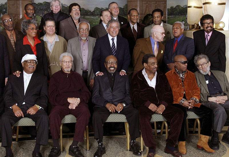 
              FILE - In this Friday, Jan. 13, 2006 file photo, Jazz legends pose for a group portrait of National Endowment for the Arts Jazz Masters of the past and present, in New York. At foreground right is writer Nat Hentoff. His son, Tom Hentoff, said his father died on Saturday, Jan. 7, 2017, from natural causes at his Greenwich Village apartment. He was 91. Also in the photo are, from left, front row: Clark Terry, Frank Foster, James Moody, Chico Hamilton, Roy Haynes and jazz writer Nat Hentoff; middle row: John Levy, Nancy Wilson, Chick Corea, Barry Harris, Tony Bennett, Jim Hall, Slide Hampton and David Baker; top row: Ron Carter, Bob Brookmeyer, Ray Barretto, Buddy DeFranco, Paquito D'Rivera, McCoy Tyner and Freddie Hubbard. (AP Photo/Bebeto Matthews)
            