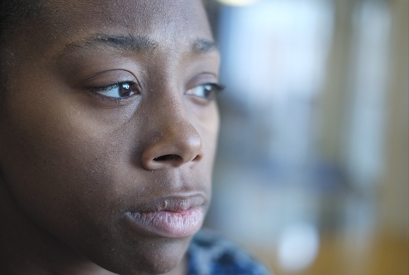 Bianca Horton, mother of 1-year-old Zoey Duncan who was shot Jan. 7 in College Hill Courts, talks Friday, Jan. 16, 2015, in the lobby of Erlanger Children's Hospital about her daughter's recovery. 