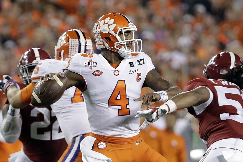 Clemson's Deshaun Watson throws during the first half of the NCAA college football playoff championship game against Alabama Monday, Jan. 9, 2017, in Tampa, Fla. (AP Photo/David J. Phillip)