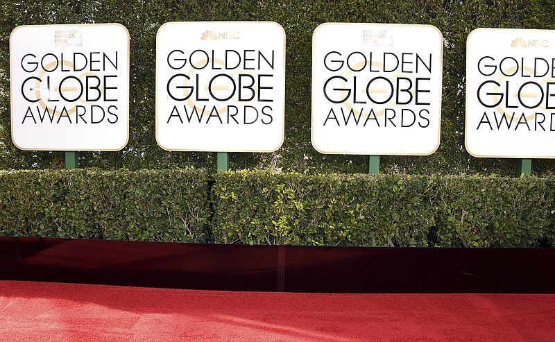 
              Signage appears along the red carpet at the 74th annual Golden Globe Awards at the Beverly Hilton Hotel on Sunday, Jan. 8, 2017, in Beverly Hills, Calif. (Photo by Jordan Strauss/Invision/AP)
            