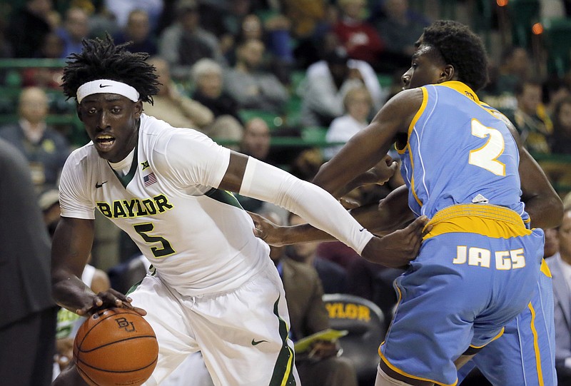 Baylor forward Johnathan Motley (5) drives to the basket past Southern's Emanual Shepherd (2) in the second half of an NCAA college basketball game, Wednesday, Dec. 14, 2016, in Waco, Texas. (AP Photo/Tony Gutierrez)