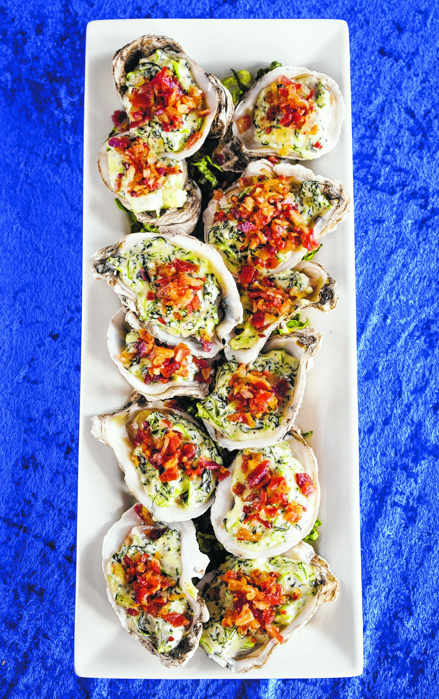 Oysters Rockefeller at Catch Bar and Grill. (Photo by Mark Gilliland)