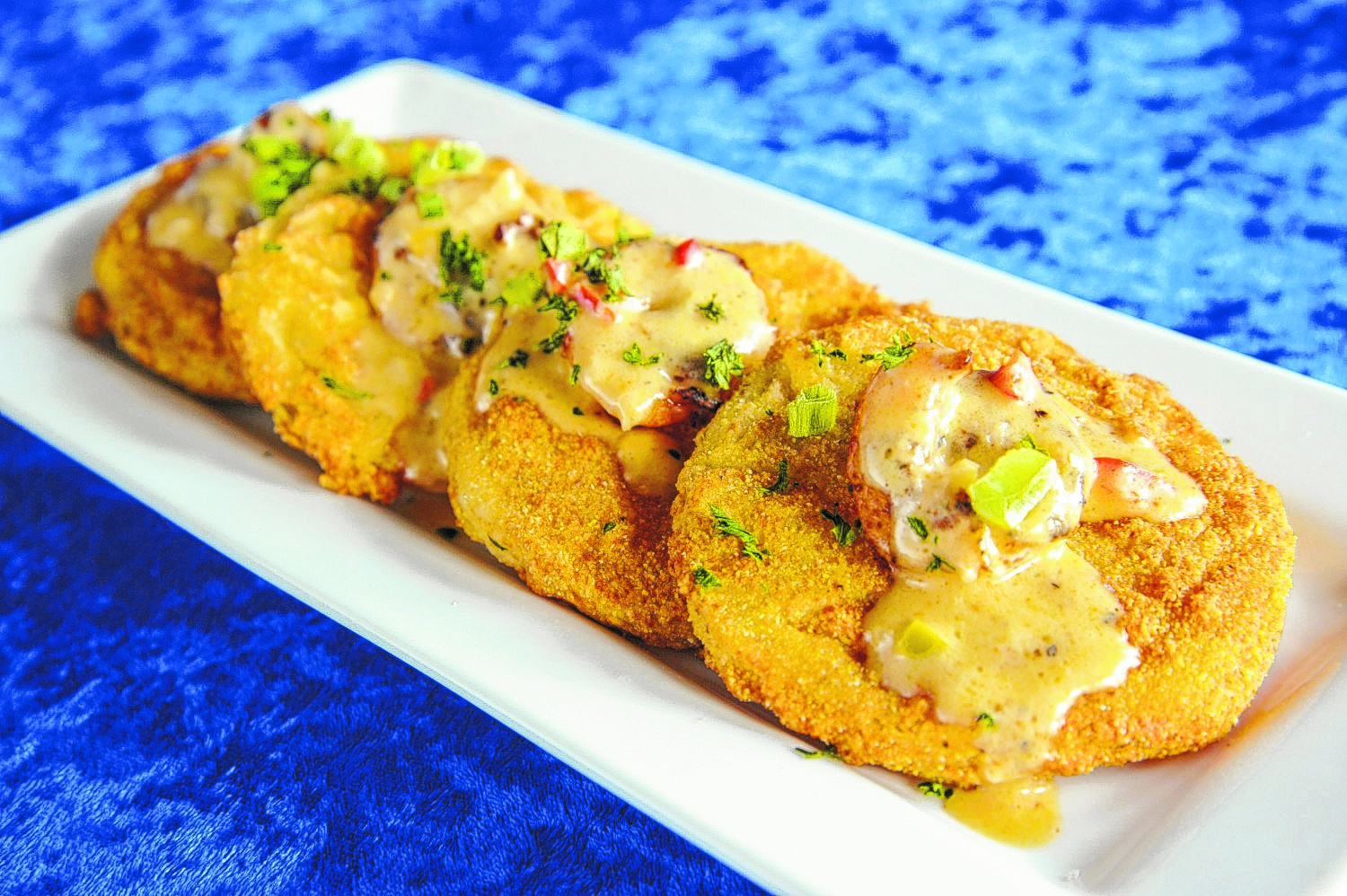 Fried green tomatoes at Catch Bar and Grill. (Photo by Mark Gilliland)