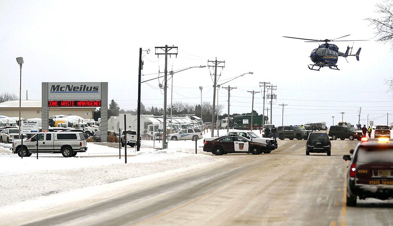 
              Emergency responders are called to a McNeilus Truck & Manufacturing facility in Dodge Center, Minn., after a report of a possible explosion at the plant that injured several people, Wednesday, Jan. 11, 2017.  The incident occurred about 10:20 a.m. Fire crews from nearby towns were called in and Minnesota Energy workers were on the scene. (Elizabeth Nida Obert/The Rochester Post-Bulletin via AP)
            